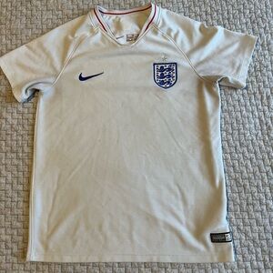 Nike White England Soccer Jersey with Blue Logo and Red Trim